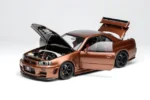 ⁦Nissan Skyline GT-R (R34) Customized 1:18 Scale Diecast Model Car by MOTORHELIX – Brown⁩ - الصورة ⁦3⁩