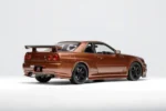 ⁦Nissan Skyline GT-R (R34) Customized 1:18 Scale Diecast Model Car by MOTORHELIX – Brown⁩ - الصورة ⁦2⁩