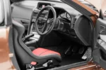 ⁦Nissan Skyline GT-R (R34) Customized 1:18 Scale Diecast Model Car by MOTORHELIX – Brown⁩ - الصورة ⁦5⁩