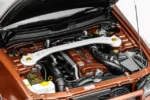 ⁦Nissan Skyline GT-R (R34) Customized 1:18 Scale Diecast Model Car by MOTORHELIX – Brown⁩ - الصورة ⁦7⁩