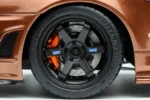 ⁦Nissan Skyline GT-R (R34) Customized 1:18 Scale Diecast Model Car by MOTORHELIX – Brown⁩ - الصورة ⁦9⁩