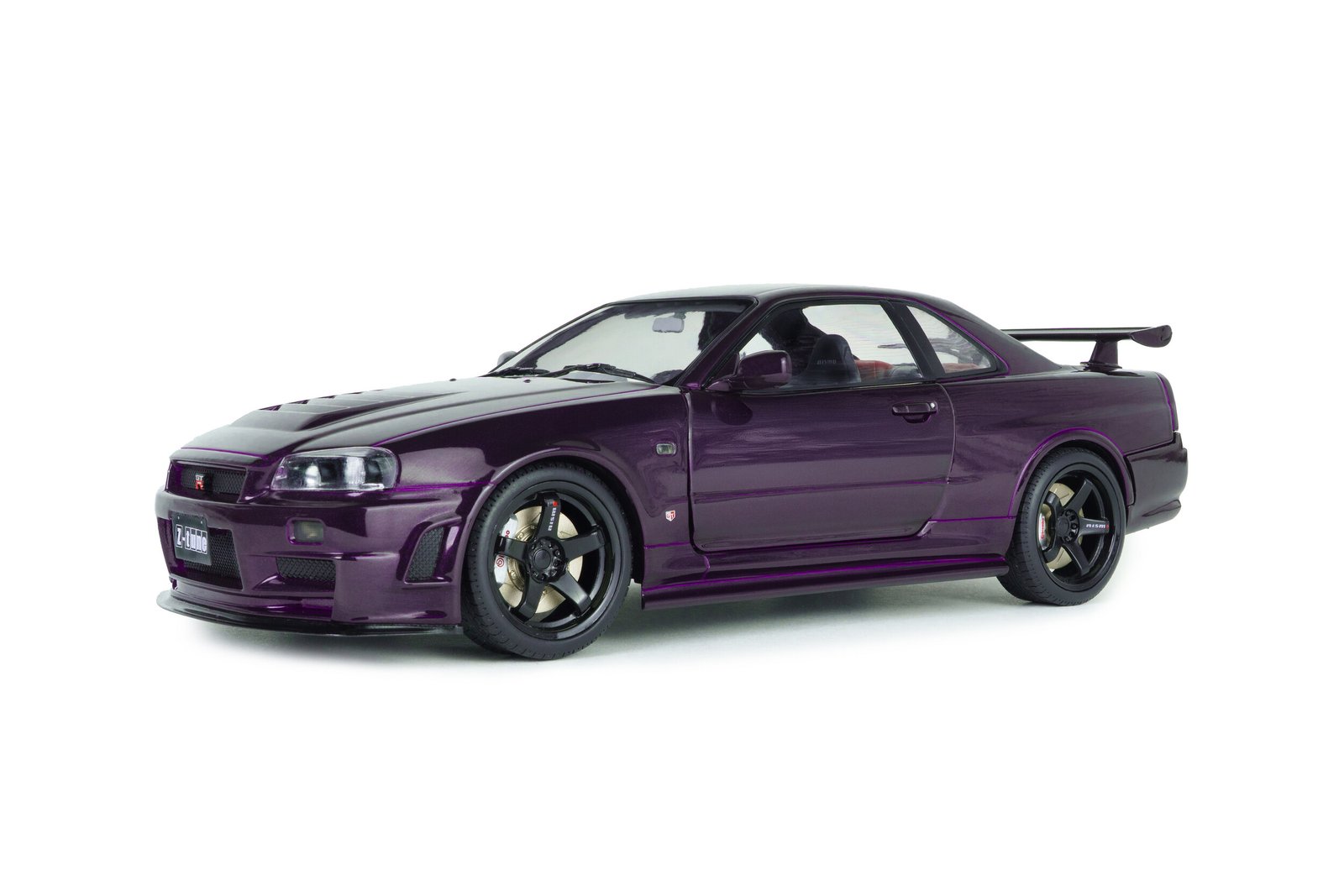 SLD-036-BC (1) 1999 Nissan Skyline GT-R (R34) Z-Tune 1:18 Scale Diecast Model Car by Solido – Purple - Image 1